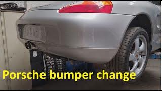 Replacing a Porsche Boxster rear bumper.