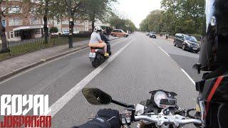 BMW S1000Rs almost beaten by a scooter in a drag race