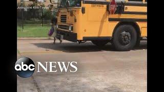 Car blows past school bus stop sign nearly hitting child