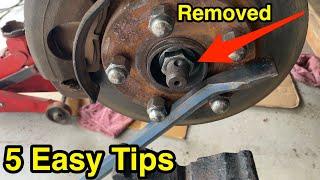 5 DIY tips to remove stuck axle shaft nut without impact tools.