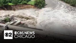 Destructive flooding hits Iowa Minnesota