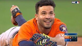 Altuve nearly triples but trips on his helmet