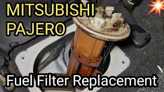 Replace fuel filter Mitsubishi Pajero petrol in tank filter