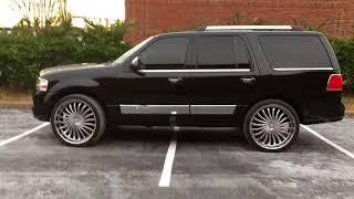 RimTyme RVA - 2011 Lincoln Navigator sitting on 26’ Chrome Kronik PSYKS and 2953026 Lexani’s