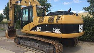 CAT 320C digger operating and demonstration