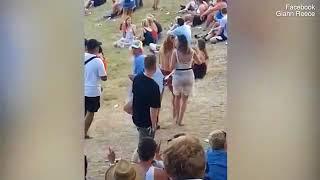 Topless woman attacks man who groped her at Rhythm & Vines music festival