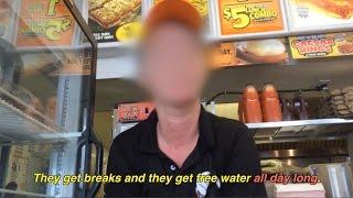 Little Caesars employee holding sign in 100 degree desert sun