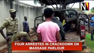 Four arrested in crackdown on massage parlour