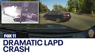 Video shows LAPD cruiser crashing into vehicle