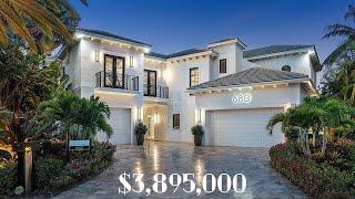 Exclusive Waterfront Living on a Beautiful Point Lot in Upscale Boca Raton