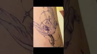 Timelapse tattooing process falling angel.