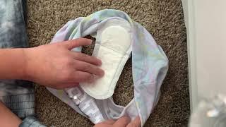 how to open a pad & and liner quietly and how to put a pad & and liner on