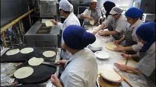 Hand Rolled Gujarati Chapati Factory  Rotli  Roti Production Line at RK Dining in Preston UK