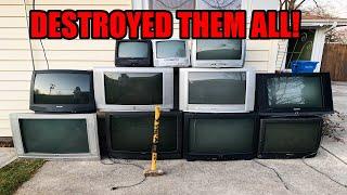 SMASHING A WALL OF GIANT TVS DESTROYING ELECTRONICS