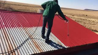 Airless-spray painting a roof