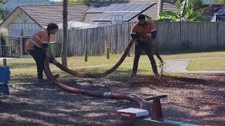 Garden maintainance in Australia   filling mulch in garden