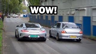 Modified cars leaving a car show 100% Auto Live 2019