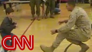 A boy with cerebral palsy walks to his Marine dad for the first time