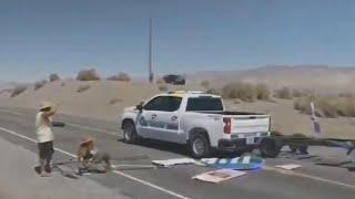 United States police officer gets fed up with climate protesters