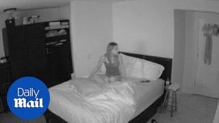 Footage captures ghost-like activity while woman sleeps