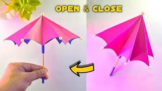 How to make a paper UMBRELLA that open and close  Paper Umbrella Making  Very Easy