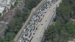 405 crash 10-vehicle collision involving 2 big rigs causes massive traffic backup