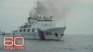 China rams Philippine ship while 60 Minutes on board South China Sea tensions could draw U.S. in