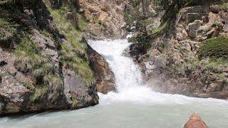 The Sound of a Waterfall and a Powerful Stream of Water