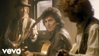 The Traveling Wilburys - End Of The Line Official Video