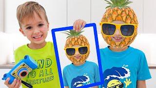 Vlad and Niki play with photos  Funny videos for kids