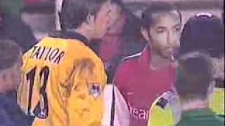 Henry speaks with the referee the match against Newcastle nervously