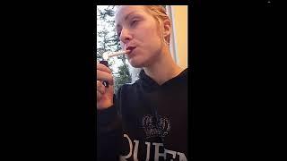 Girl spitting hocking as she smokes