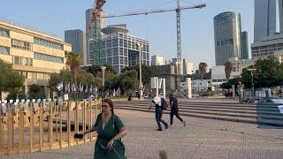 Relatives of Hamas hostages run for cover as sirens sound in Tel Aviv  AFP