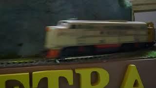 A 600mm x 600mm HO Scale Pizza Model Railroad Petra Pizza Running the aggregate train