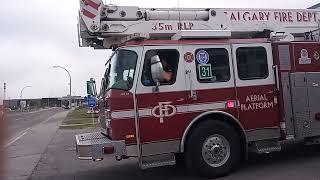 Calgary Fire Department Tower 31 responding HOT to alarms.