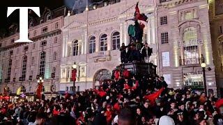 Morocco fans celebrate in London after victory over Spain in the World Cup