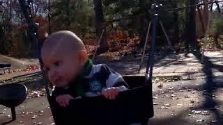 Baby Gabe loves the swing 9 months old