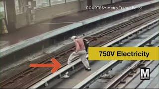 Man jumps over deadly electric rails on Metro train tracks