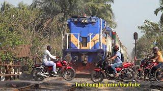 Train Passing through a Busy Rail Crossinggate-Sundarban Express of Bangladesh Railway