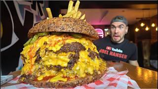 TRYING TO BEAT A 12LB BURGER CHALLENGE WITH 100 PIECES OF CHEESE  Joel Hansen