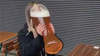 Girl Drinks a Giant Beer