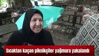 Sıcaktan kaçan piknikçiler yağmura yakalandı