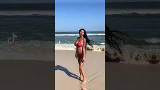 Sexy Mexican woman modeling red bikini on the beach #asmr #trending #fashion