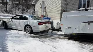 Dodge Charger AWD no winter tire pulling 3500 lbs trailer on snow.