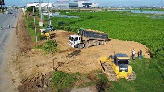 Bulldozer Shantui CH17C3 Dozer D31S & 12 wheels truck5Ton trucks pushing soil to delete huge pond