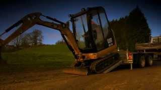 Cat® Mini Excavators Working in Various Applications