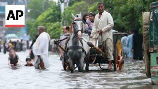 Record rainfall floods streets and affects daily life in Lahore Pakistan