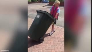 Video of Lacey McMillan putting the bins out