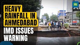 Ahmedabad Heavy Rain Alert IMD Issues Warning As Flooding And Potholes Resurface On Roads