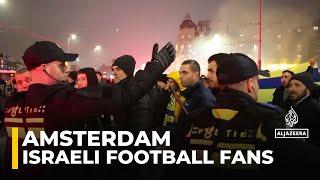 Israeli football fans clash with protesters in Amsterdam